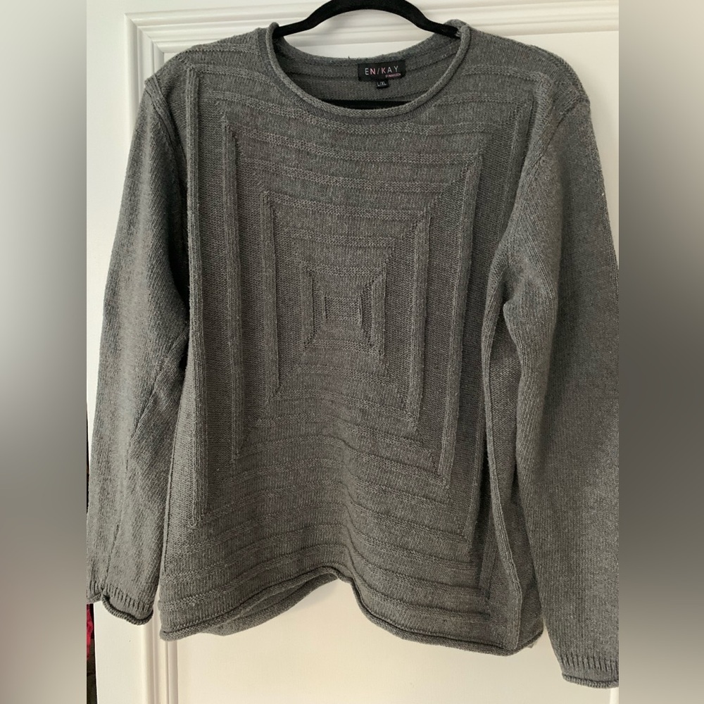 Gray sweater with geometric detail